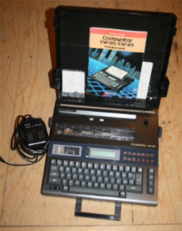 Elektronisk skrivemaskine med adapter